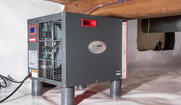 Installed dehumidifier in crawl space Dehumidifier installed in a residential crawl space