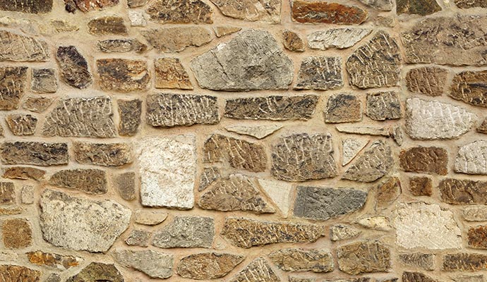 Rustic natural fieldstone wall texture