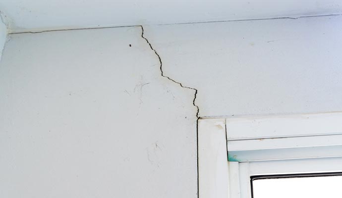 large cracks on the wall