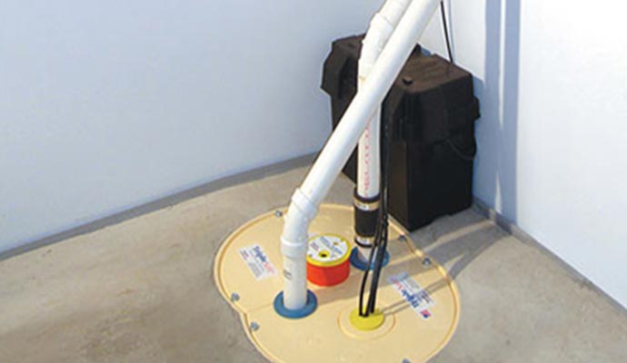 Installed sump pump in a basement
