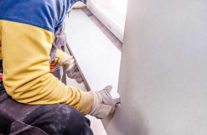 Professional installing window frame
