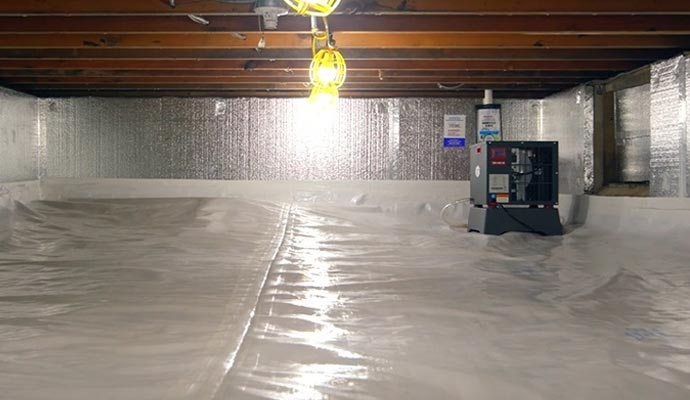Encapsulated crawl space insulation dehumidification