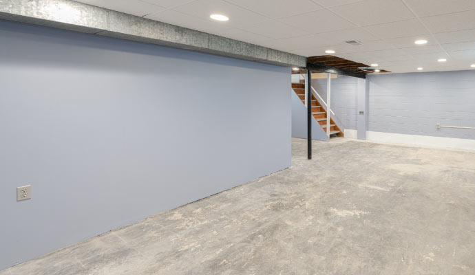 Unfinished basement with concrete floor